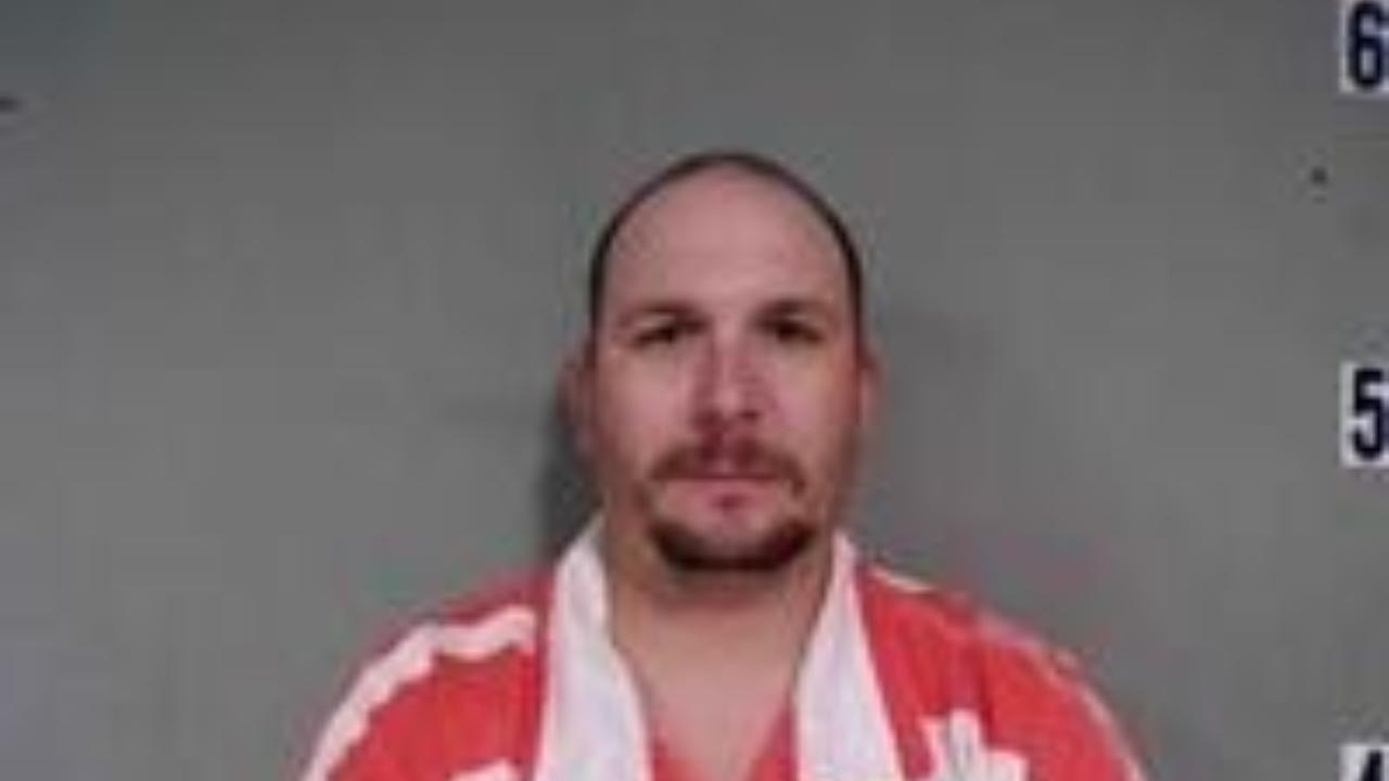 DUTTRY, TRAVIS CHARLES charged with Telephone Harassment 1st Offense
