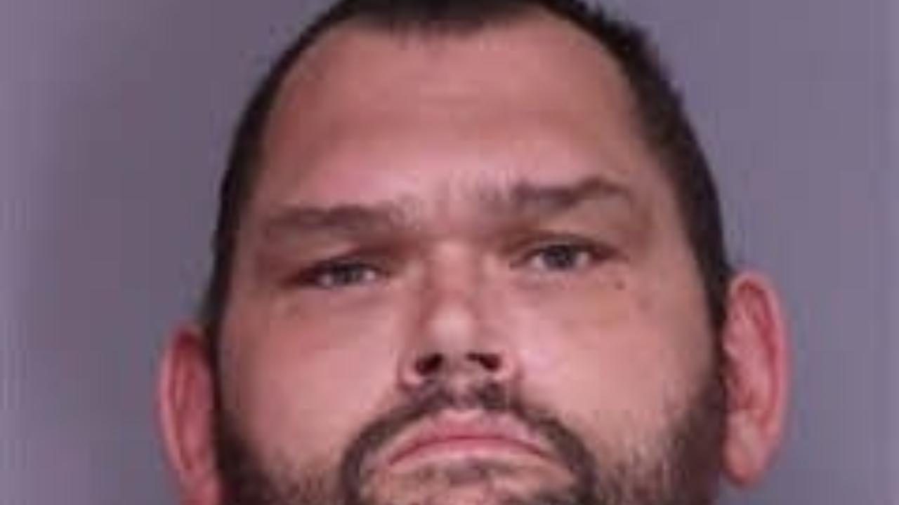 CURTIS ALLEN TACKETT charged with Assault and Battery Third Degree