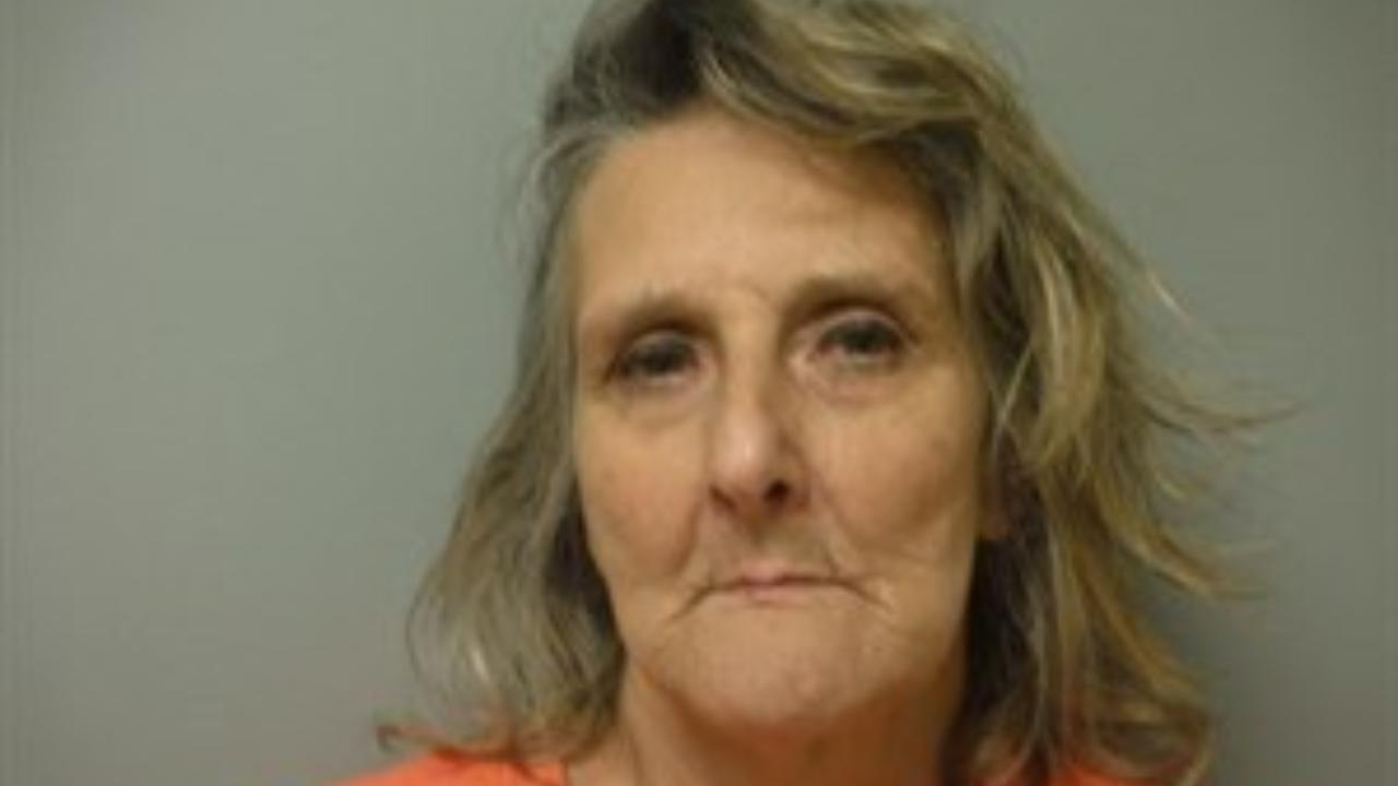 Walls, Sandra booked