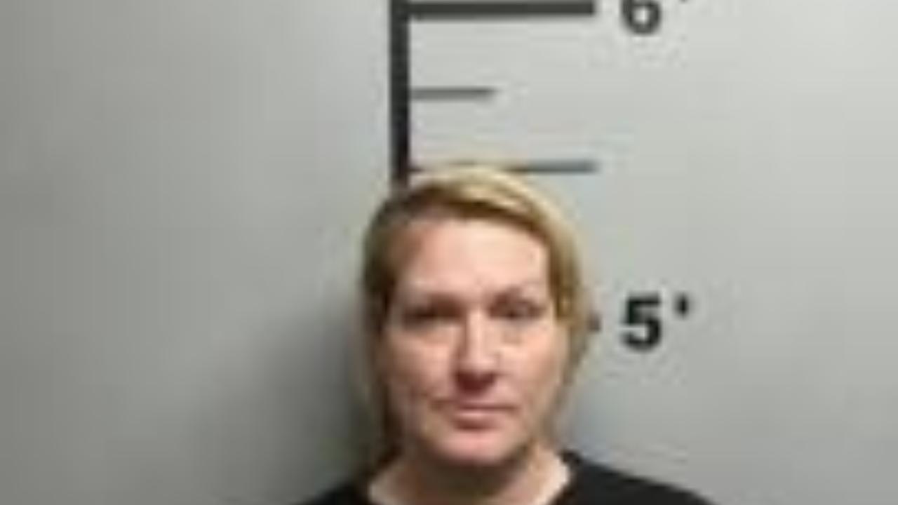 MORRIS, LISA MARIE charged with Revoke warrant F202603832 issued by Benton, AR