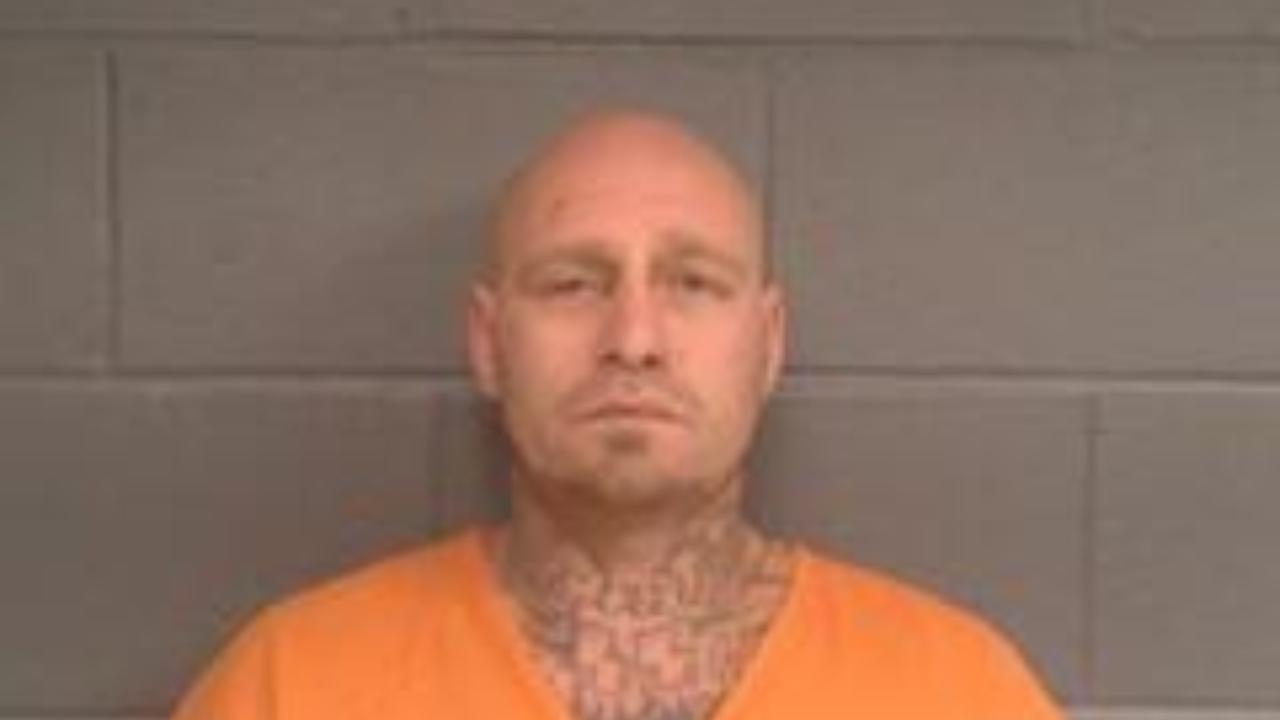Orr, Shawn Michael Charged with Endangering Others While Eluding Police Officer; Reckless Driving; Driving with License Canceled, Suspended or Revoked; Failure to Stop at Red Light; Transporting Open Container - Beer; Improper Driving on Divided Highway; Unsafe Lane Use