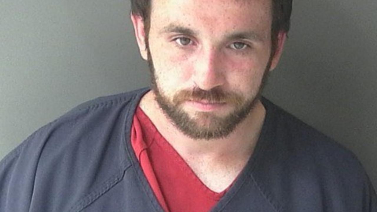 Austin Mykal Neal charged with Warrant Service